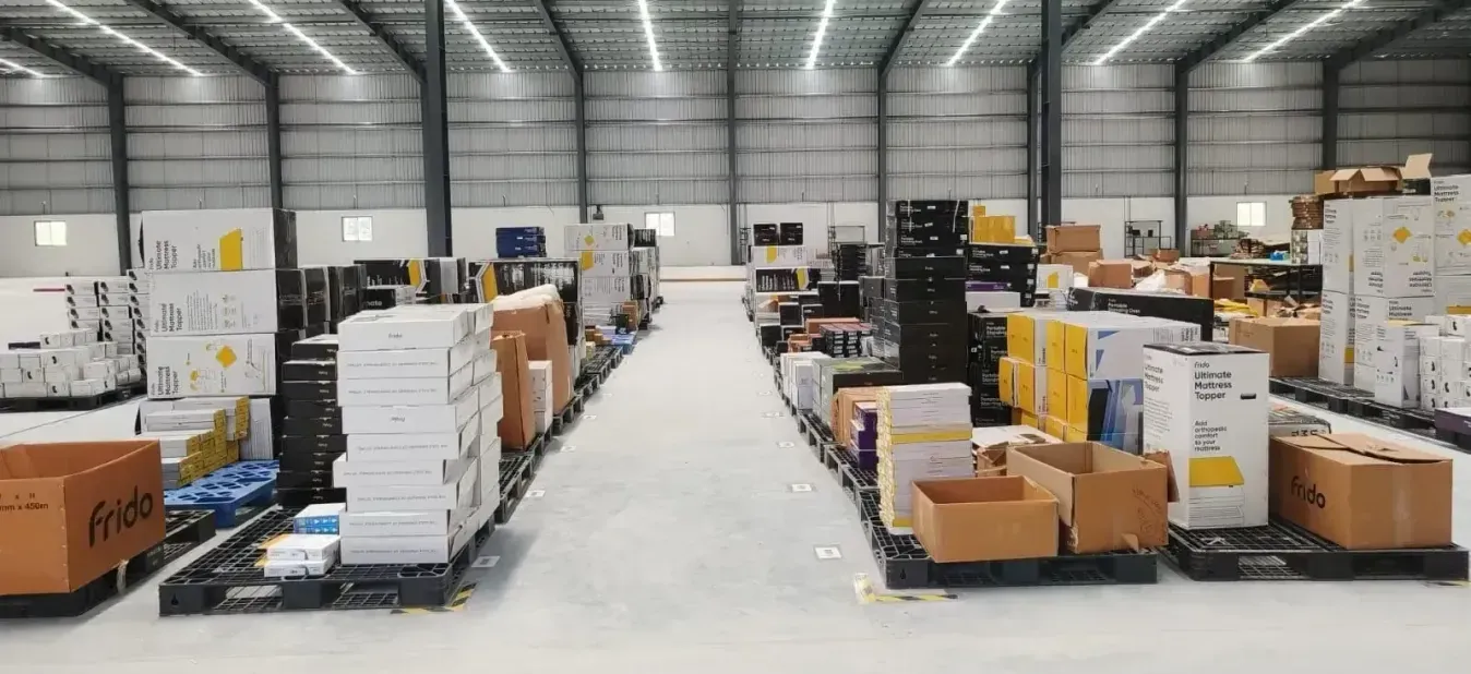 Frido inventory palletised in a Hexalog warehouse